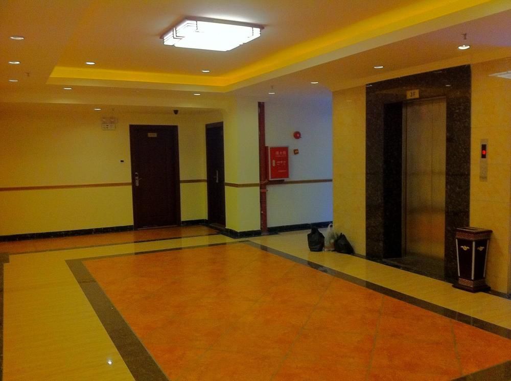Guoxing Business Hotel Чжаоцин Екстер'єр фото