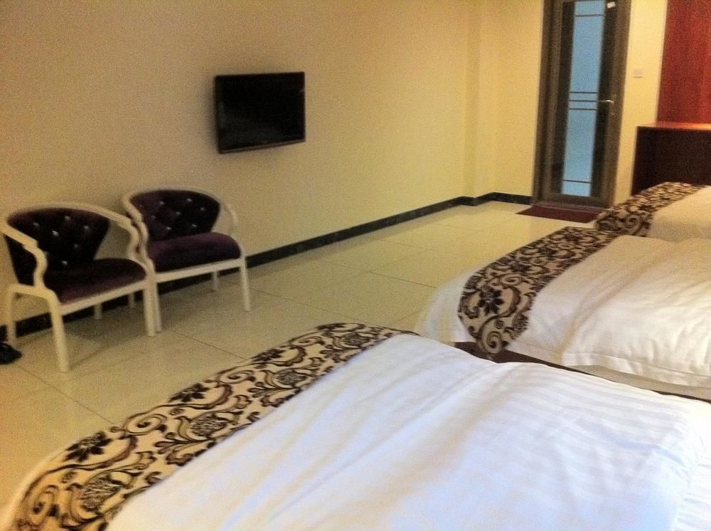 Guoxing Business Hotel Чжаоцин Екстер'єр фото
