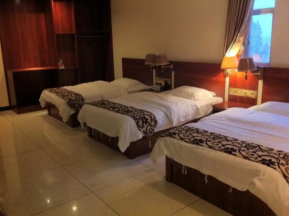 Guoxing Business Hotel Чжаоцин Екстер'єр фото