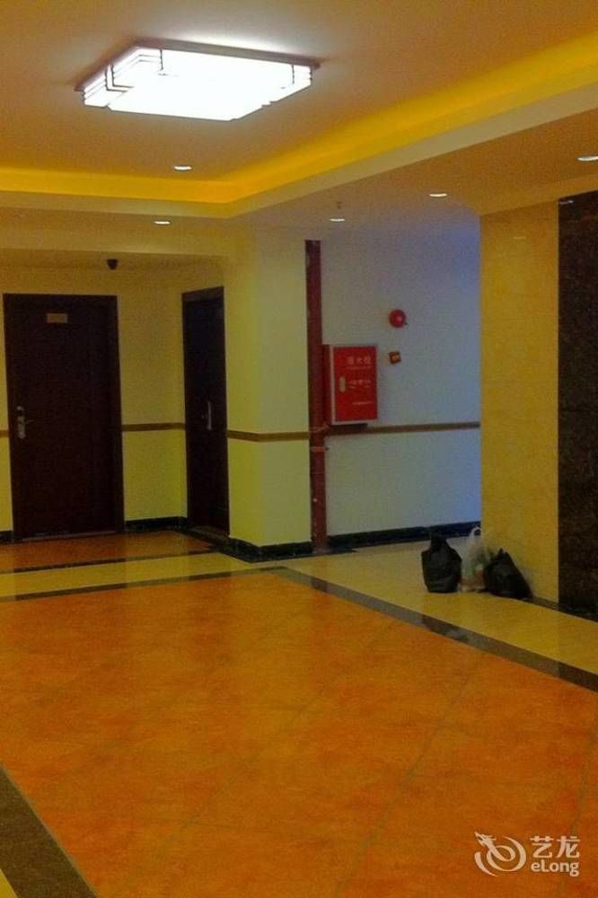 Guoxing Business Hotel Чжаоцин Екстер'єр фото