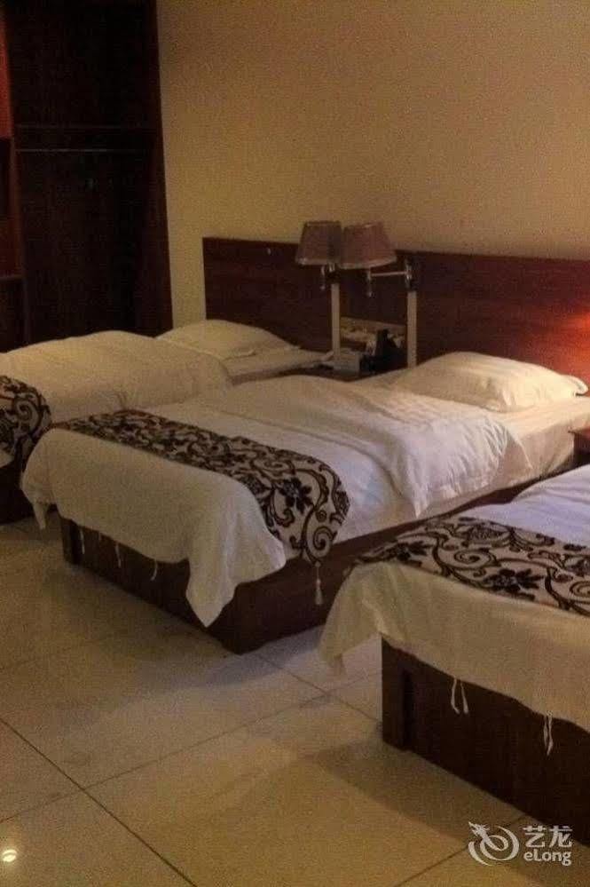 Guoxing Business Hotel Чжаоцин Екстер'єр фото
